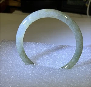 A Preowned Chinese glassy jadeite bangle bracelet green/brownish texture rounded - Picture 1 of 8