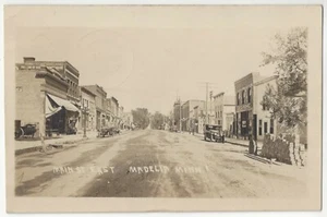 1916 Madelia, Minnesota - FOTO REAL Main Street - Postal vintage - Imagen 1 de 2