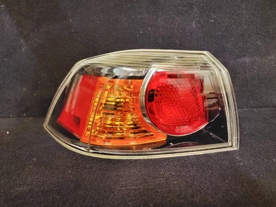 2012 Mitsubishi Lancer Left tail light OEM - Image 1 of 2
