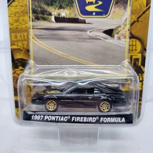 UH Greenlight 1:64 1987 Pontiac Firebird Formula County Roads Black Gold New - Picture 1 of 8