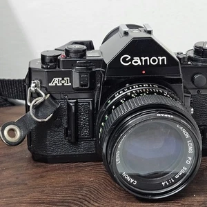 Squeak-free! Canon A-1 Black 35mm Pro SLR Camera FD w/50mm f/1.8 lens, Data Back - Picture 1 of 23
