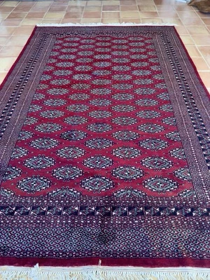 Alfombra paquistaní vintage BOKHARA anudada a mano 100 % lana ~ Excelente ~ 9’5” x 6’3” Foto 1 de 4