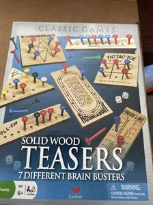 NIB Solid Wood Brain Teasers Seven Different Brain Busters Classic Games - Picture 1 of 2