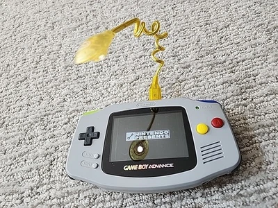 Luz de gusano amarilla Nyko para Nintendo Game Boy GBA Game Boy Advance PROBADA Foto 1 de 4