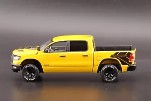 Auto World 2023 Dodge Ram Rebel Havoc Edition Baja Giallo AWSP164 A 1/64 - Foto 1 di 7