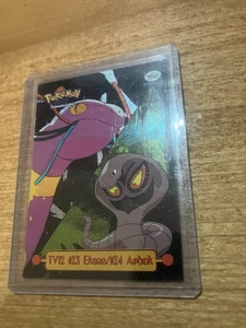 1999 Topps Pokemon Series 1 TV Animation TV12 Ekans Arbok Foil Blue Logo NM - Picture 1 of 6