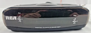 Digital Alarm Clock RCA RP4842A Dual WakeAM/FM Radio Battery Backup - Picture 1 of 4