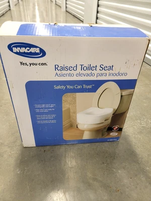 Asiento de inodoro elevado Invacare *ARTÍCULO DE CAJA ABIERTA* Foto 1 de 4