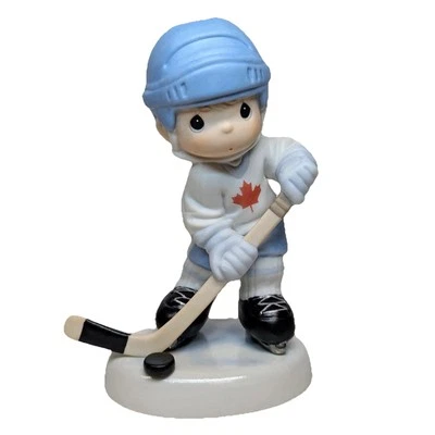 Precious Moments Canada Exclusive Let’s Keep Our Eyes On The Goal Hockey Player - Image 1 of 4