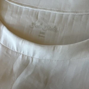 NWOT Bad Birdie Women’s Large Golf Dress Cream Performance Pockets Sleeveless - Picture 1 of 9