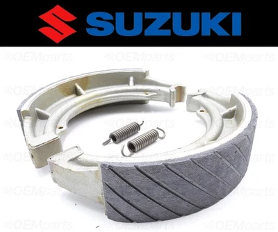 Juego de (2) zapatas de freno y resortes traseros ranurados al agua Suzuki #64400-31830 Foto 1 de 4