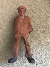 old black forest carved man with stick 