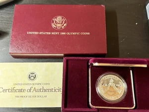 Dólar de plata olímpico 1988-S prueba acuñación de Estados Unidos conmemorativo certificado de autenticidad OGP y caja - Imagen 1 de 5