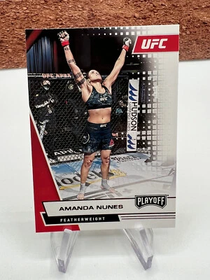 2021 PANINI CHRONICLES UFC  PLAYOFF Pink Parallel AMANDA NUNES NO. 64 - Image 1 of 2