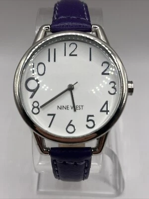 Reloj de cuarzo para mujer Nine West caja plateada 38 mm correa púrpura - batería nueva Foto 1 de 4