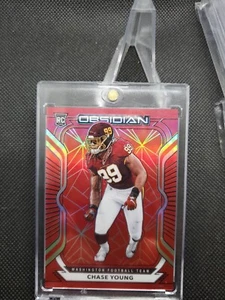 Chase Young 2020 Panini Obsidian #102 Red Flood RC Rookie SSP #04/26 Commanders - Bild 1 von 3