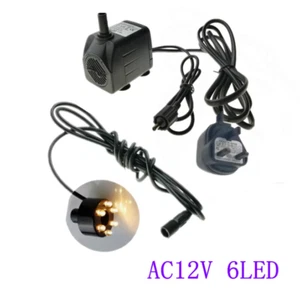 GPH 12 V elektrische Springbrunnenpumpe 15 W mit 6 warmen Lichtern Tauchpumpe Wasserpumpe UK - Bild 1 von 5