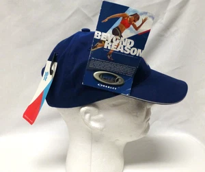 Cappello berretto Adidas 2012 Olimpiadi di Londra blu NUOVO con spilla Oakley - Foto 1 di 7