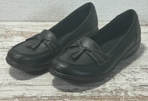 Mocasín Clarks Ashland Burbuja Cuero Negro Sin Cordones Para Mujer 9M Borla Sutil - Imagen 1 de 6