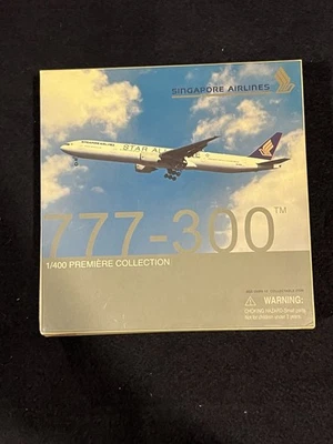 DRAGON 1/400 Boeing 777-300 Singapore Airlines 9V-SYE 55749 airplane diecast - Image 1 of 4