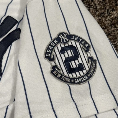Camiseta vintage majestuosa del equipo juvenil Derek Jeter a rayas de los New York Yankees #2 M Foto 1 de 4