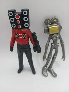 HOTPLACY 2er Set Skibidi Toys Cartoon Actionfiguren - Bild 1 von 4