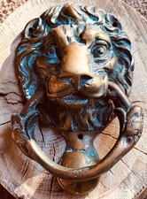 Antique bronze lion head door knocker