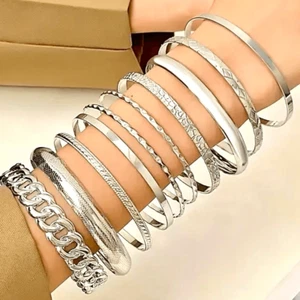 Splendido set bracciali argento lucido 10 pezzi nuovo con etichette - Foto 1 di 12