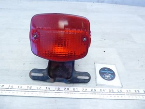 1979 Kawasaki KZ750 Twin K609-2) rear brake tail light with mount bracket works - Picture 1 of 12