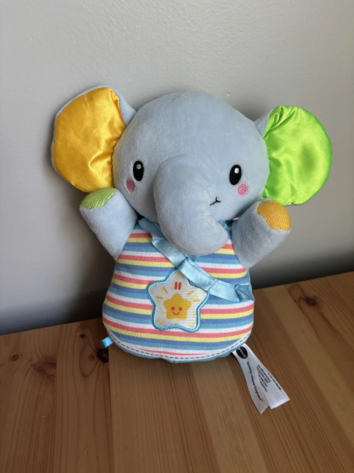 Juguete suave de peluche para bebé Vtech brillantes elefante azul chupete que cambia de color Foto 1 de 1