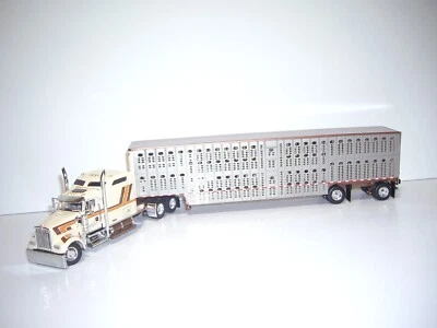 DCP FIRST GEAR 1/64 PARADISE TRUCKING KW W900L W/T SLEEPER & LIVESTOCK TRAILER - Image 1 of 4