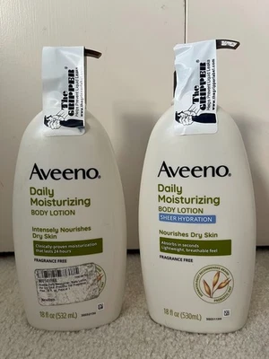 Loción corporal hidratante diaria Aveeno sin fragancia paquete de 2 variedades de 18 OZ ea Foto 1 de 2
