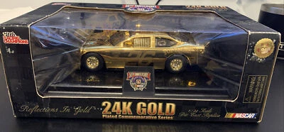 1998 Racing Champions escala 1/24 ouro 24K Johnny Benson #26  - Imagem 1 de 4