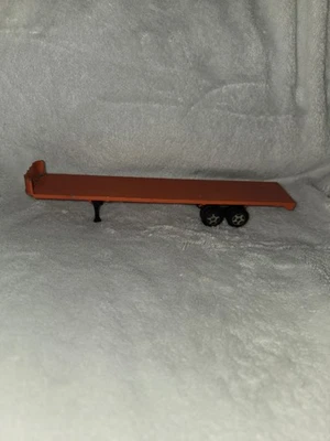 ERTL 1:64 Truck Trailer Flat Bed Orange 7 Inch Long Die Cast - Image 1 of 4