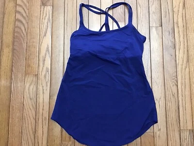 Camiseta sin mangas Lucy para mujer Fitness azul verdadero sujetador de estante incorporado pequeña entrecruzada yoga Foto 1 de 4