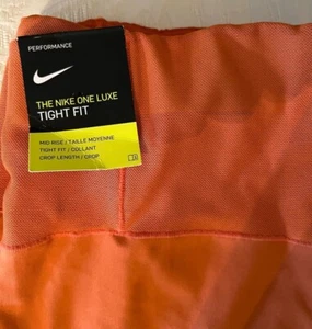 NWT NIKE One Luxe Women's Mid-Rise Crop Length Leggings Tight Fit Orange 1X - Picture 1 of 4