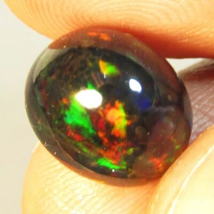 Impresionante ópalo negro natural de 4,27 quilates 12,2 x 10,2 x 7,5 mm ¡Piedra preciosa ovalada de Etiopía! - Imagen 1 de 5