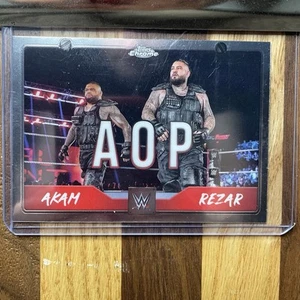 2025 Topps Chrome WWE TAG-AOP Rezar Akam Tag Team - Picture 1 of 2