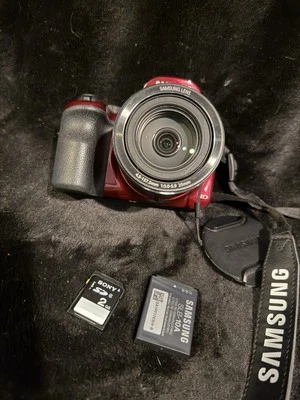 Цифровая камера Samsung серии WB WB1100F 16,2 Мп Wi-Fi и NFC 35-кратный оптический зум красная - Изображение 1 из 4