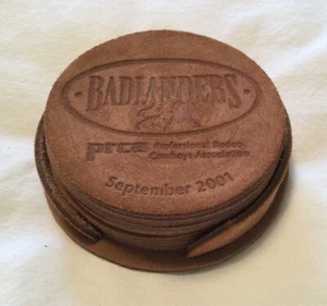 Juego de montaña rusa de cuero Badlanders PRCA septiembre 2001 - Imagen 1 de 3