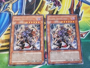 Yugioh - Alien Overlord CRMS-EN038 NM 1st ed/Unlim Rare X2 - Picture 1 of 1