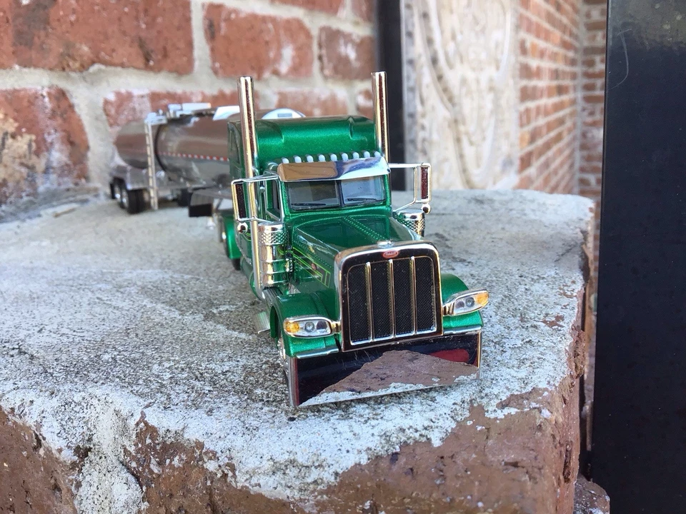 1:64 DCP 389Peterbilt Midroof W/Brenner Tanker FiganBaum Trans. - Image 1 of 4