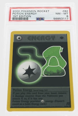 PSA 8 NEAR MINT-MINT 2000 Pokémon Team Rocket #82 Potion Energy 1st Edition !!! - Image 1 of 4