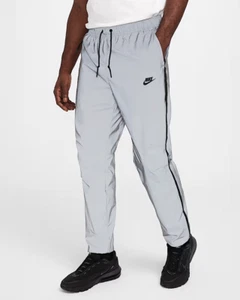 Taglia M - Pantaloni Nike Tech Woven Flash argento riflettente nero FZ7587-035 - Foto 1 di 5
