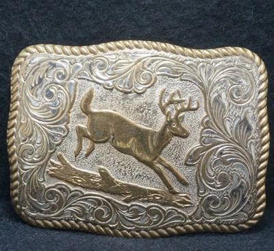 XC13114 VINTAGE AÑOS 70 ****TRONCO SALTADOR CIERVO**** OBRAS DE ARTE DE VIDA SILVESTRE HEBILLA DE CINTURÓN PARA HOMBRES Foto 1 de 2