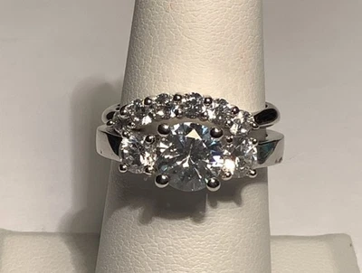 Juego de anillos de boda de aniversario de tres piedras con circonitas .925 talla 7 (1135) Foto 1 de 4