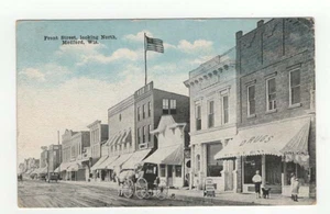 Postal de colección de 1916 Front Street Medford WI farmacia - Imagen 1 de 2