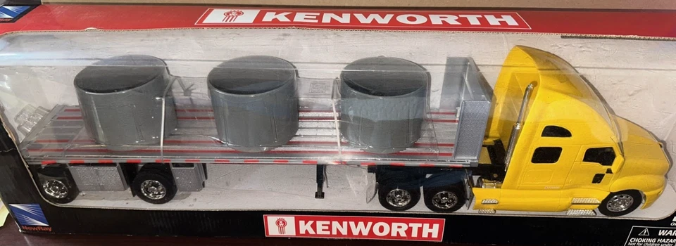 New Ray 1/32 Yellow Kenworth T2000 Sleeper Flatbed Truck / Pipes #12253 #788* - Image 1 of 1