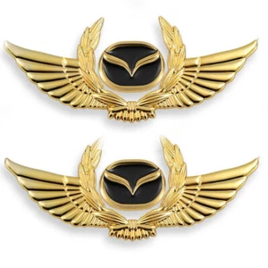 2x Gold Black Wing Emblem Badge for Mazda 3 6 9 CX-5 MX-5 CX-7 RX-7 RX-8 Miata - Imagen 1 de 2