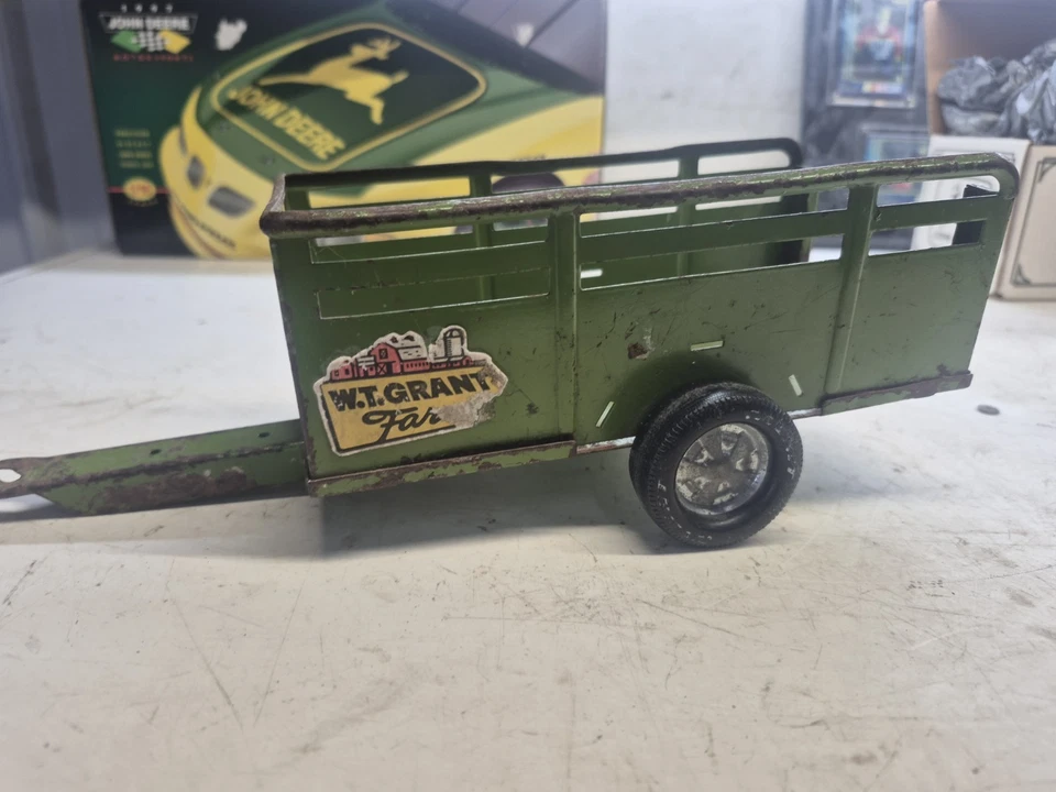 Vintage WT Grant Farms Green Tin Toy Farm Trailer 12" Long No Tailgate 1960s - Image 1 of 4